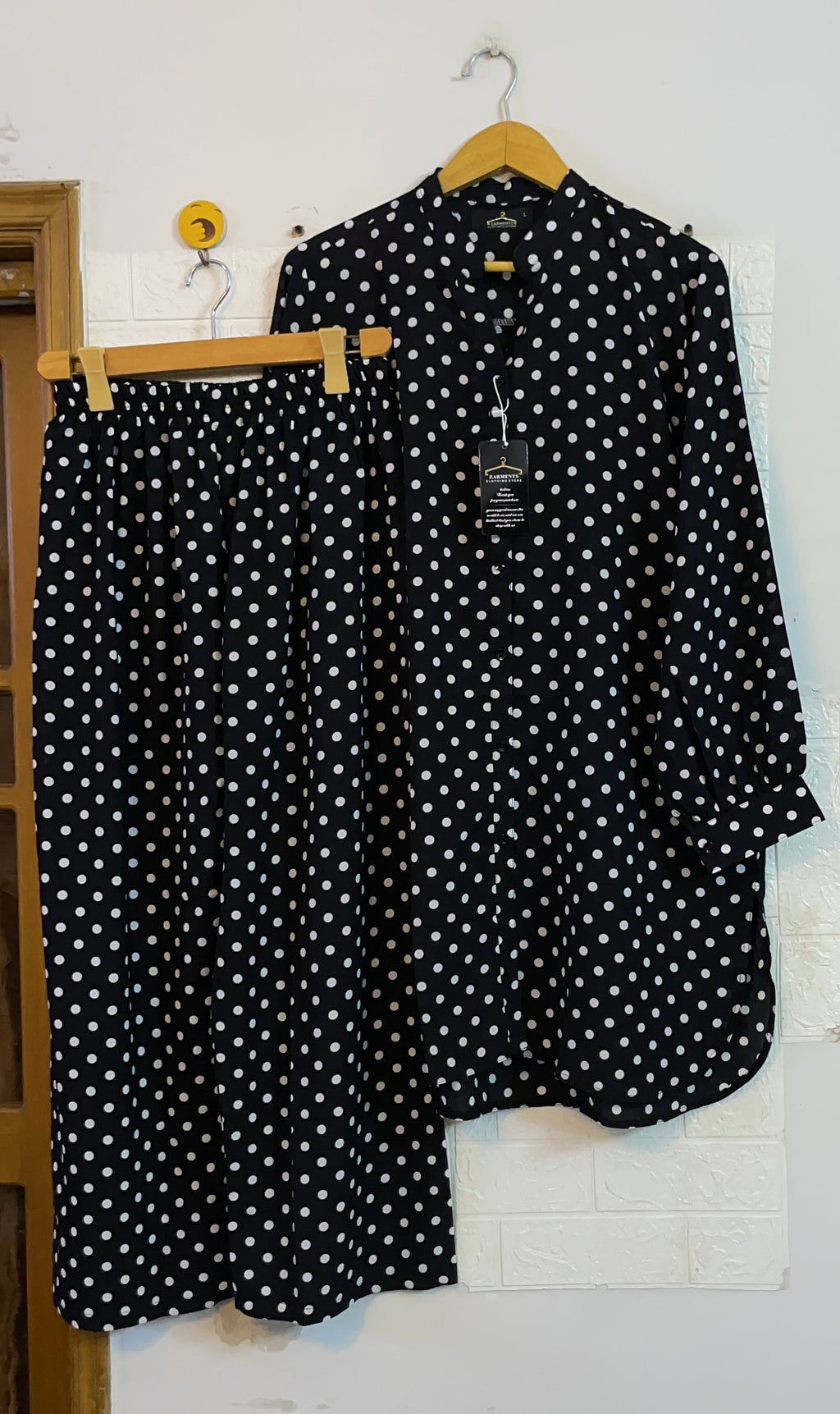 Black polka restocked