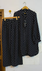 Black polka restocked